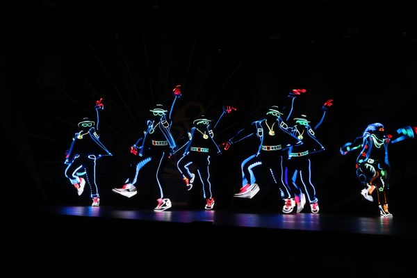 Glow in the dark dancers on stage